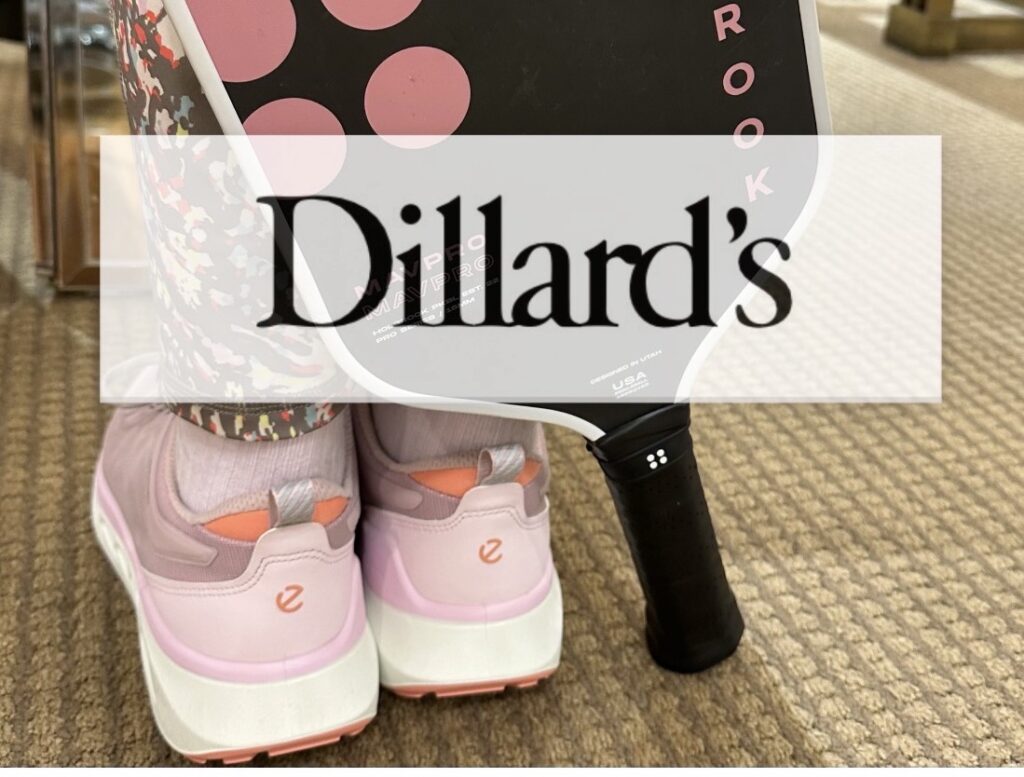Tennis shoes and pants witha pickle ball racket and the Dillard's logo over them